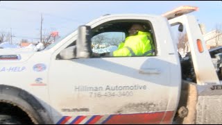 Tow truck driver assists motorists during snowstorm [upl. by Iem461]