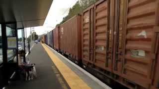 KiwiRail DL locomotives passing through Waikanae station  Feb 21 2014 [upl. by Neelyad939]