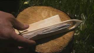 Ray Mears  How to carve a needle and gauge for net making Northern WIlderness [upl. by Bagger]