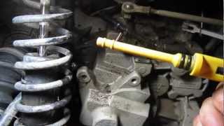 How to Change the Transmission Fluid on a Polaris Sportsman ATV [upl. by Doralia]