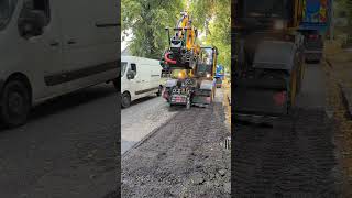 Cutting through defective tarmac with ease amp speed jcb potholes construction excavator operator [upl. by Orland882]