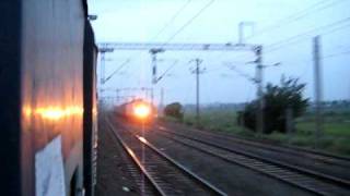 Coalfield Express with Gomoh WAP7 Flashes its Headlights and Crosses Shaheed Express [upl. by Marilyn968]