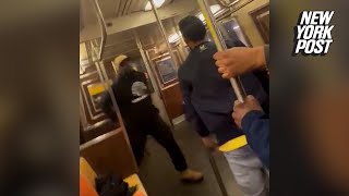 WATCH Harrowing video shows men clashing moments before NYC subway shooting [upl. by Nairrod]