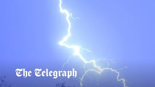 UK weather Dramatic thunderstorms light up night sky above London as flood warnings issued [upl. by Wind]