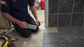 Tommys Trade Secrets  How To Tile A Floor [upl. by Kifar724]