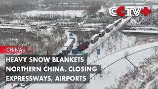 Heavy Snow Blankets Northern China Closing Expressways Airports [upl. by Aicilev]