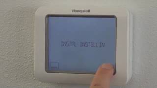 Fabrieksprogramma instellen Chronotherm Touch Modulation  Honeywell Home [upl. by Oijile]