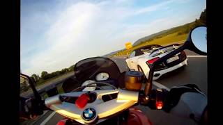 Bmw K1300 R vs Audi R8 Incredible [upl. by Bluefarb]