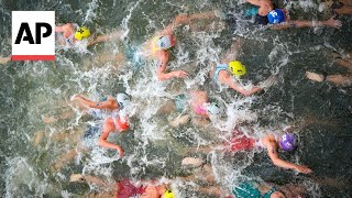 Triathlon kicks off on Day 5 at Paris Olympics  AP Top Photos [upl. by Leirud]