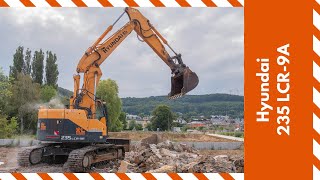 Hyundai Robex 235LCR9A short radius excavator clearing up demolition debris  Midweek Moments [upl. by Nidya]