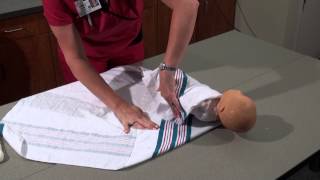 Parenting and Infant Care  How to Swaddle a Baby  Womans Hospital  Baton Rouge La [upl. by Harutek]