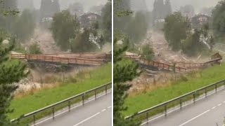 Nubifragio in Alto Adige il torrente in piena a Valdaora travolge e porta via un ponte [upl. by Sirret]