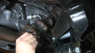 Installing Rough Country Jeep JK Exhaust Spacer [upl. by Nerval]