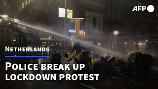 Dutch police use water cannon on Covid protesters  AFP [upl. by Maiocco]