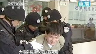 Chine  des prisonniers étrangers paradés avant leur exécution [upl. by Nailimixam157]