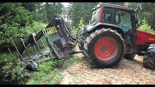 Valtra forestry tractor turns around on the narrow road [upl. by Gessner717]