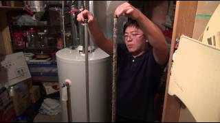 How to Replace A Water Heater Sacrificial Anode Rod [upl. by Lleroj]