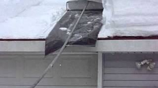 Snow Removal Roof 1222011MOV [upl. by Irac132]