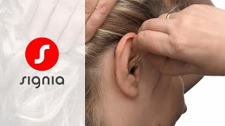 How to take a Pure ChargeampGo AX out of the ear  Signia Hearing Aids [upl. by Olnay]