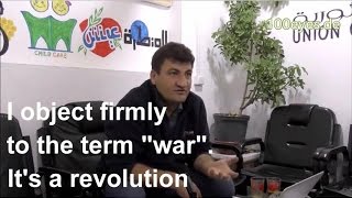 Interview with Raed Fares Union of Revolutionary Bureaus Kafranbel Syria [upl. by Ellehcil]