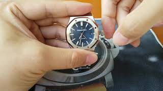 AP Royal Oak 15450 blue setting the time [upl. by Ennovahs]