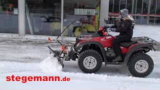 ATV mit einem Schneeschild beim Schnee schieben im Winter 2009 [upl. by Enilrac415]