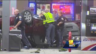 Video shows car crashing into gas pump flipping over [upl. by Hendren689]