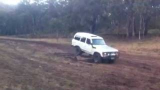 Im14 Driving Dads Cruiser over a few logs Janowen Hills 4x4 Park [upl. by Gaven]