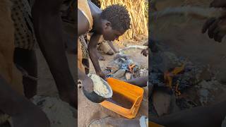 Bushmen hadzabe make cooking ugali [upl. by Adnoluy]