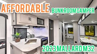 BUNKHOUSE On a BUDGET  2023 Mallard M32 Walkthrough  Affordable Camping for the Whole Family [upl. by Iggam]