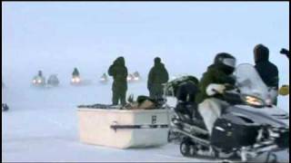 Canadian Forces arrive by snowmobile to Arviat Nunavut [upl. by Cimbura]