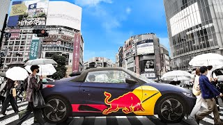 F1 Drivers Race Down World’s Busiest Street 🇯🇵 [upl. by Atiuqes]