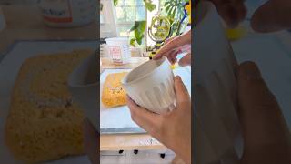 Cleaning up greenware cups ceramic pottery process [upl. by Elexa]