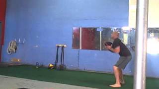 Sandbag squat w horizontal throw [upl. by Amein]