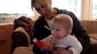 Asthma Inhaler at 11 months old Delaney can do it [upl. by Seftton]