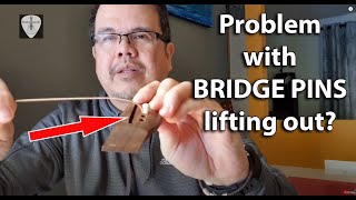 Bridge Pins Lifting When Tuning Up  Acoustic Guitar Tip  EdwinE [upl. by Oznole]