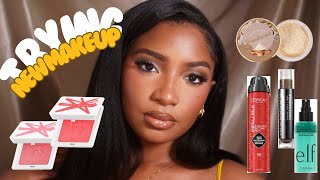 TRYING NEW MAKEUP Fenty Beauty Makeup Revolution Milk Makeup GLAMLITE ELF amp MORE [upl. by Ytsirhc699]