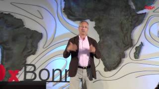 The role of remittances in a broader development context  Leon Isaacs  TEDxBonn [upl. by Essej]