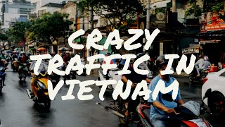 Driving through a busy roundabout in Ho Chi Minh City Saigon  Vietnam [upl. by Thornton]