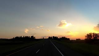 Montana 02 Sunset Driving POV Thunderhead Cumulus Cumulonimbus Thunderstorm I94 Big Sky Grassland [upl. by Avir]