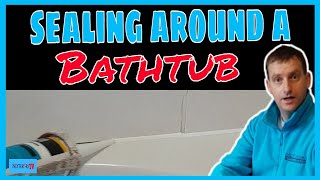 How to seal around a bathtub Sealing a bathtub [upl. by Enylodnewg765]