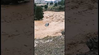 The car was washed away in the flood water flood [upl. by Yenhpad]