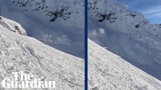 Moment avalanche sweeps over people skiing in Austria [upl. by Noillimaxam]