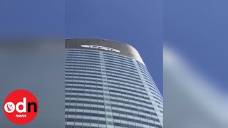 ‘French Spiderman’ scales La Defense tower in Paris [upl. by Regen831]