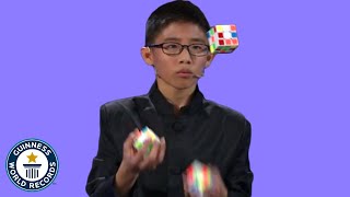 He JUGGLED and SOLVED 3 Rubiks cubes  Guinness World Records [upl. by Eiramrefinnej]