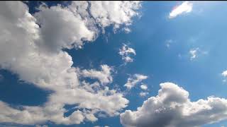 Amazing Stunning Flying Clouds In Blue Sky With Sun Ray Glare [upl. by Rikahs]