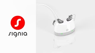 How to charge Pure ChargeampGo AX with the Pure Charger  Signia Hearing Aids [upl. by Devinne]