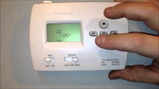 How to Program the Honeywell TH4000 Thermostat  Holland Heating and Cooling [upl. by Nyladnewg367]