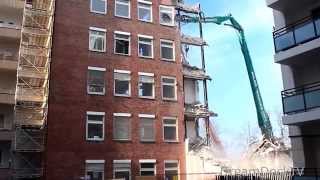 GIANT EXCAVATOR EATING LARGE BUILDING DEMOLITION CONSTRUCTION SITE [upl. by Elah]