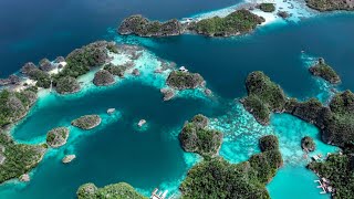 RAJA AMPAT  Diving in the most beautiful underwater world  4K Cinematic Travel Video [upl. by Ul46]